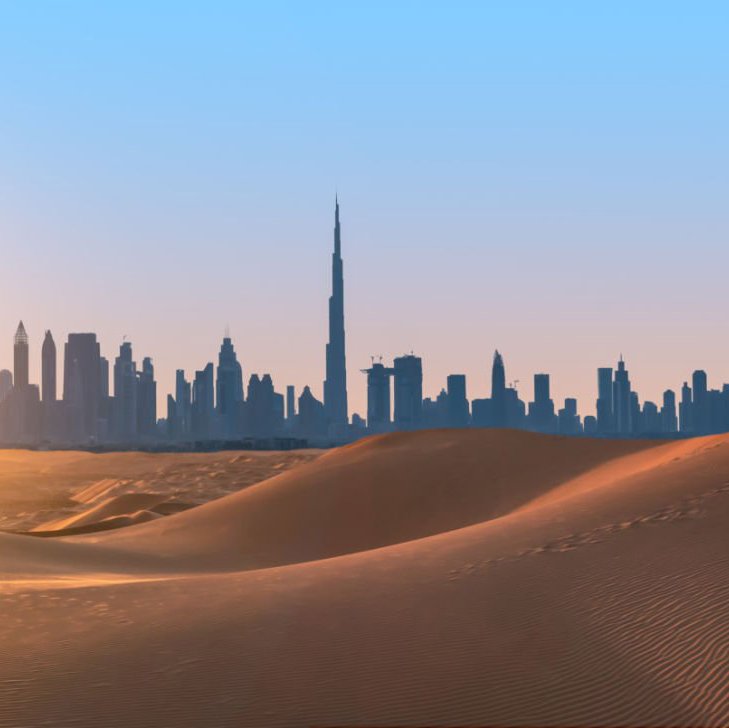 Dubai city skyline sand dunes